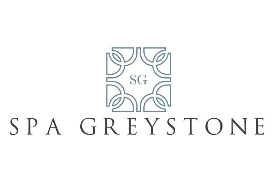 Clean, professional medical spa treatment room with neutral tones at Spa Greystone in Birmingham